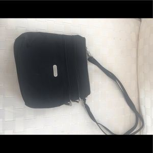 Baggalini Cross body in black w dk beige interior.